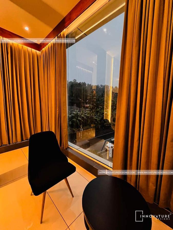 Hotel 24Inn Residency Pathanāmthitta Exterior foto